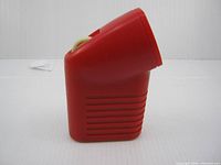 Left side profile showing angled head and body