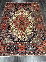 Full view of rug showing complete pattern and borders