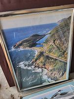 Front view of framed Cabot Trail poster showing image and frame condition