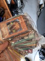 Bagged stack of Yu-Gi-Oh! cards, Kuriboh on top, visible wear
