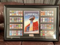 Front view showing print, ticket border, frame and matting