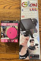 Front view of PopSolo Glow microphone box alongside Xtreme Sport speaker box