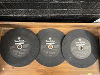 Three Makita grinding wheels front labels visible