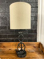 Full view of lamp showing metal base and shade