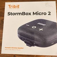 Front of retail box showing Tribit StormBox Micro 2 image and name