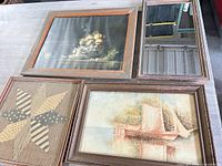 All four framed pieces laid out