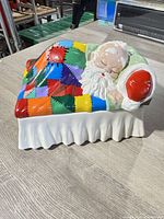 Full view of ceramic Santa trinket box with quilt lid
