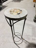 Full view of plant stand showing height and frame