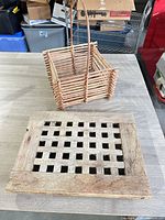 Basket and doormat on table