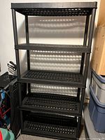 Fully assembled resin shelving unit, shows design and tier count