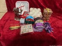 All items laid out on red cloth