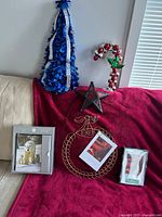 Group shot of tree, candy cane, star lantern, card holder and two boxes of cards