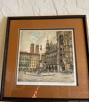 full view of framed Hans Figura cityscape print