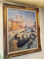 Full view of framed painting on wall