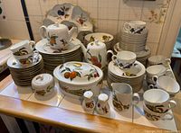 Overall view of full Royal Worcester Evesham set on countertop