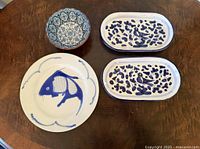 Overview of all four dishes on table