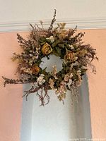 Front view of wreath showing overall design and materials