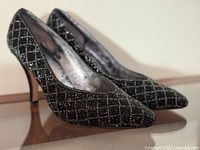 Side view of right profile of beaded pumps