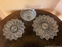Two Petal pattern platters and etched bowl on tabletop overview