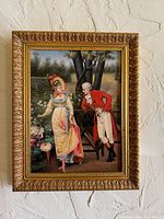 Full view of framed artwork hung on wall