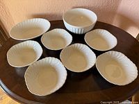 All eight bowls displayed on table