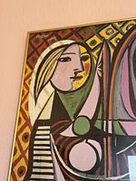 Close-up upper left of framed Picasso print