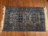 Full view of rug on hardwood floor