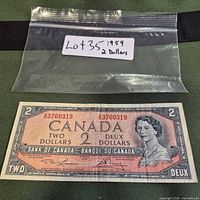 Front of 1954 $2 Bank of Canada note with identifying label