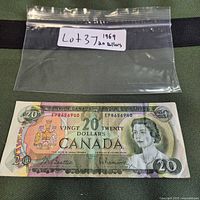 Obverse view of 1969 $20 note with serial number and portrait