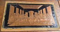 Full view of embossed copper Last Supper plaque on wood backing