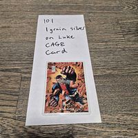 Card in sleeve on paper showing note and overall condition