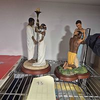 Both Ebony Visions figurines on shelf