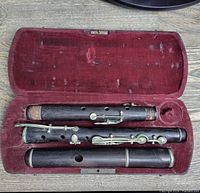 Flute body sections in velvet case
