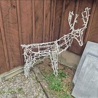 Full view of metal deer frame with lights