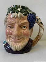 Front view of Royal Doulton Bacchus Toby jug