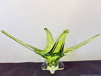 Front view showing full shape of green Chalet art glass swing bowl