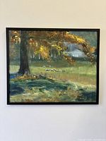 Front view of framed painting on wall