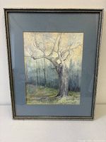 Full view of framed watercolour with mat and frame visible