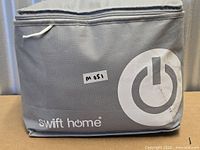 Swift Home branded gray zippered carry bag front view