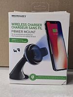 Front of retail box showing Merkury wireless charger power mount