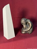 Front view of sculpture and vase