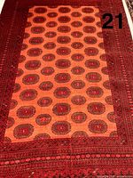 Full view of Afghan Ersary Turkman carpet showing field, borders, and scale