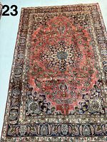 Full view of Mashhad carpet showing overall design and dimensions