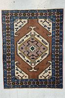 Full view of handmade Caucasian rug