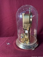 Side angle showing glass dome and base