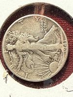 Obverse of 1941 Walking Liberty half dollar in cardboard holder