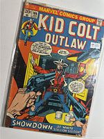 Full front cover of Kid Colt Outlaw #166 in plastic sleeve