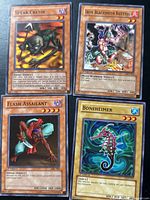 Front view of four cards: Spear Cretin, Iron Blacksmith Kotetsu, Flash Assailant, Boneheimer
