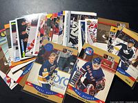 Spread of assorted hockey trading cards fanned out