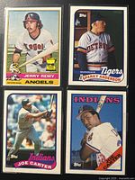 Overview of four Topps baseball cards laid out together